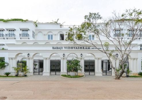 A longshot of Babaji Vidyashram School Front in daylight